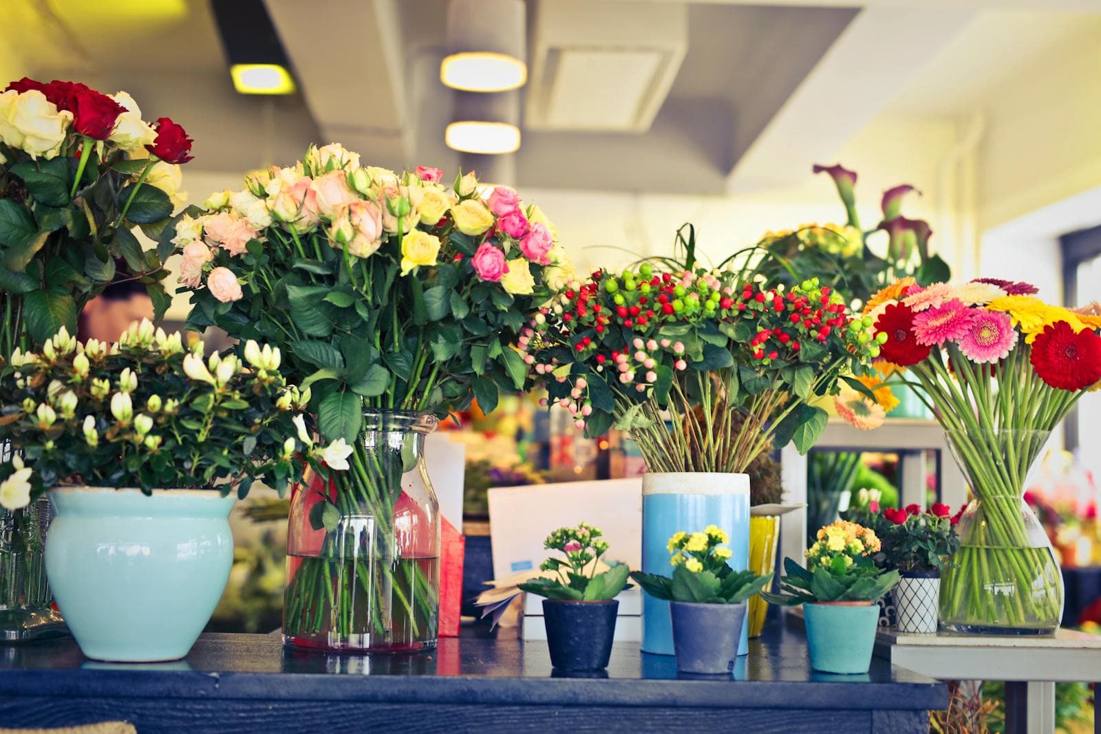 Flower-shop counter with fresh arrangements