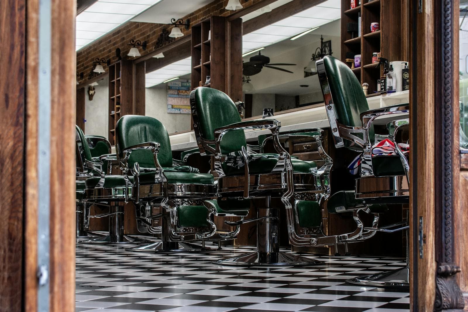 Vintage barbershop chairs on a checkered floor